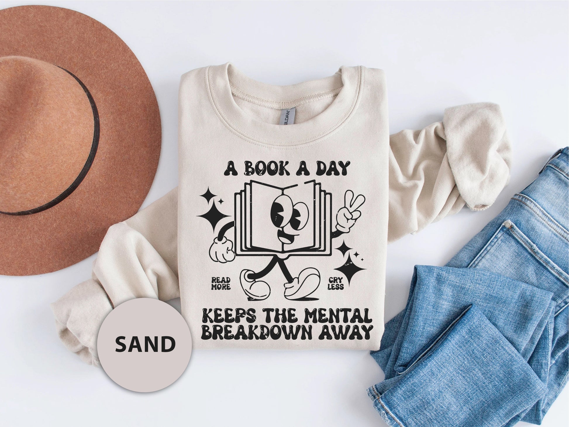 a t - shirt that reads a book a day keeps the mental breakdown away