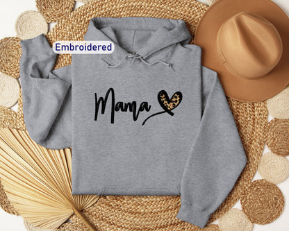 a gray hoodie with the word mama printed on it