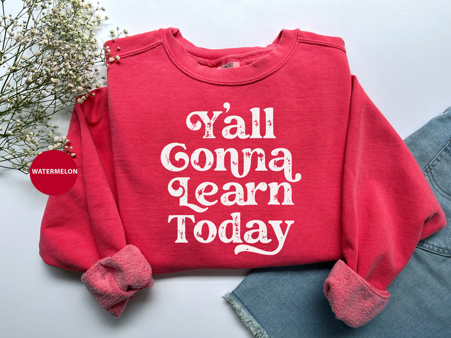 a red sweatshirt with the words y'all gona learn today printed on it