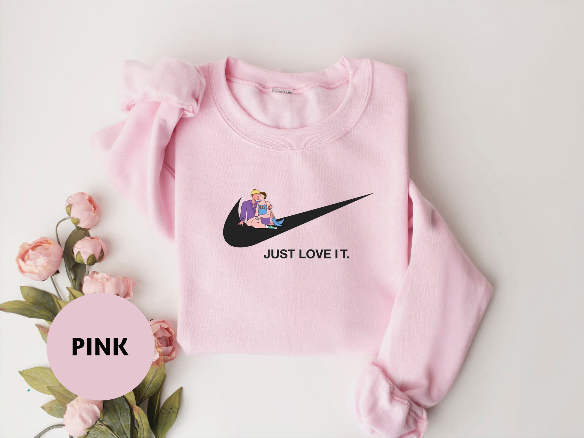 a pink sweatshirt with the words just love it on it