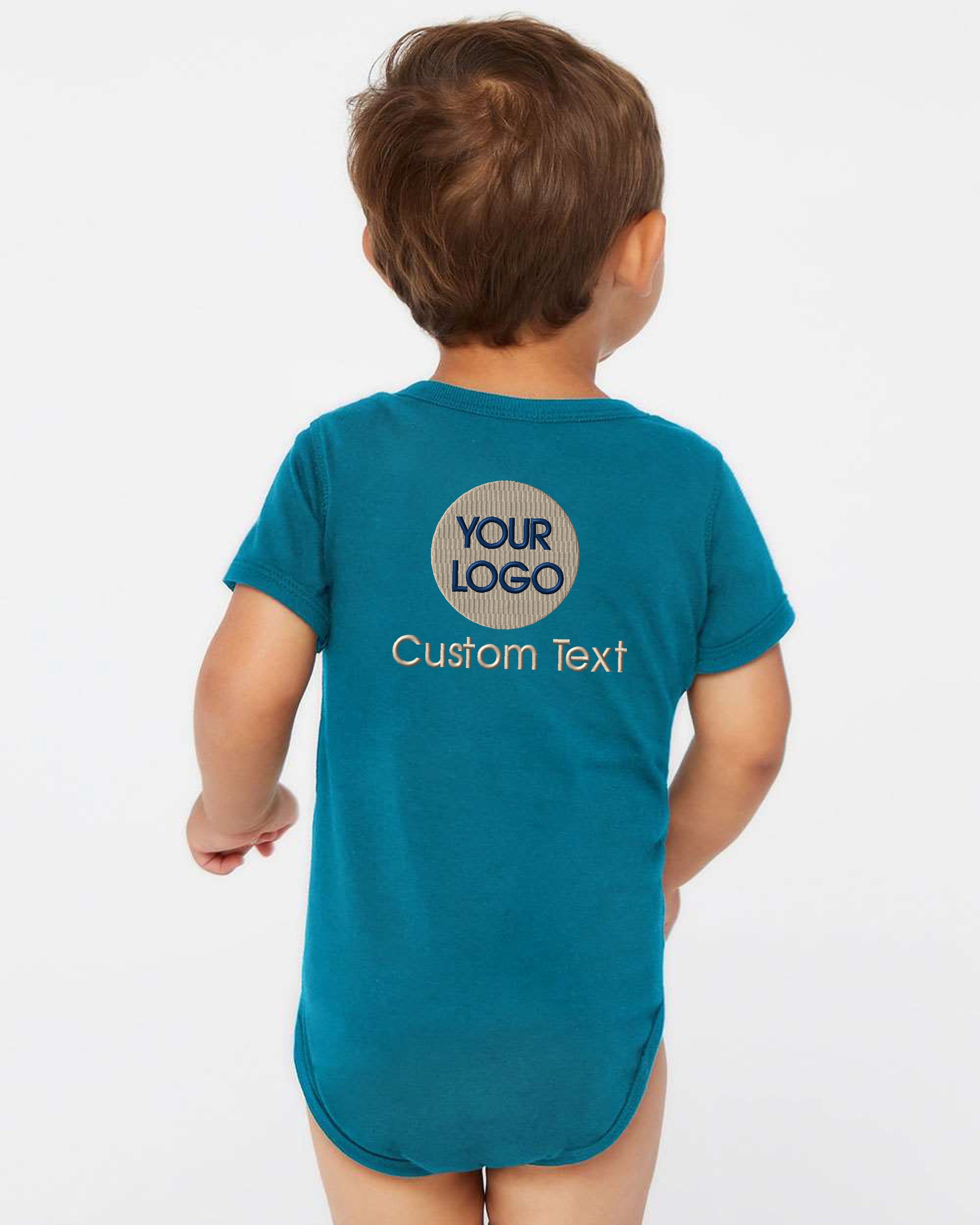 a young boy wearing a blue shirt that says your logo on it