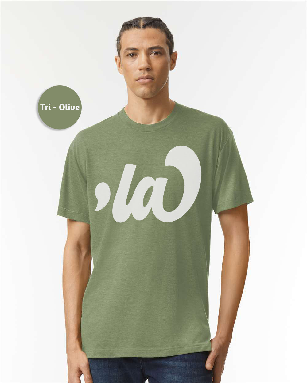 a man wearing a green t - shirt with the word la on it