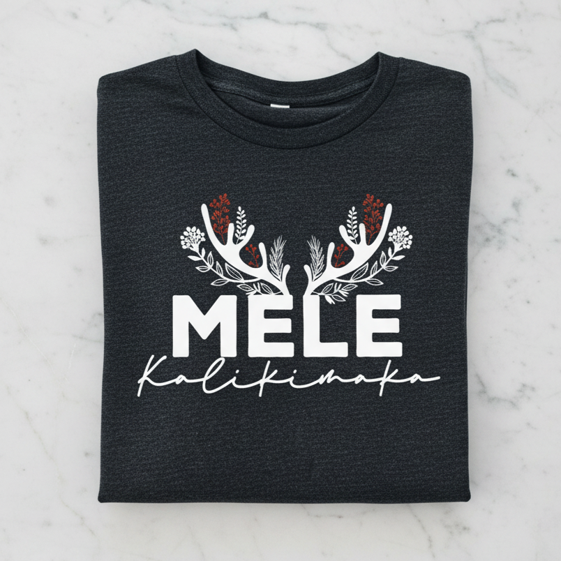 A black t-shirt with white text and floral designs printed on it.