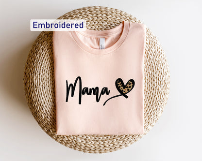 a pink shirt with the word mama written on it