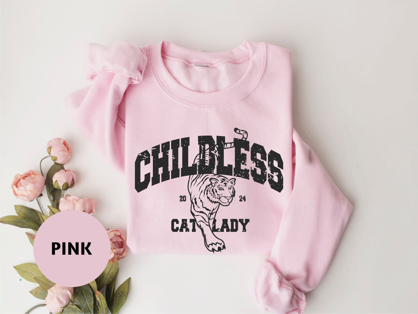 a pink sweatshirt with the word pink on it