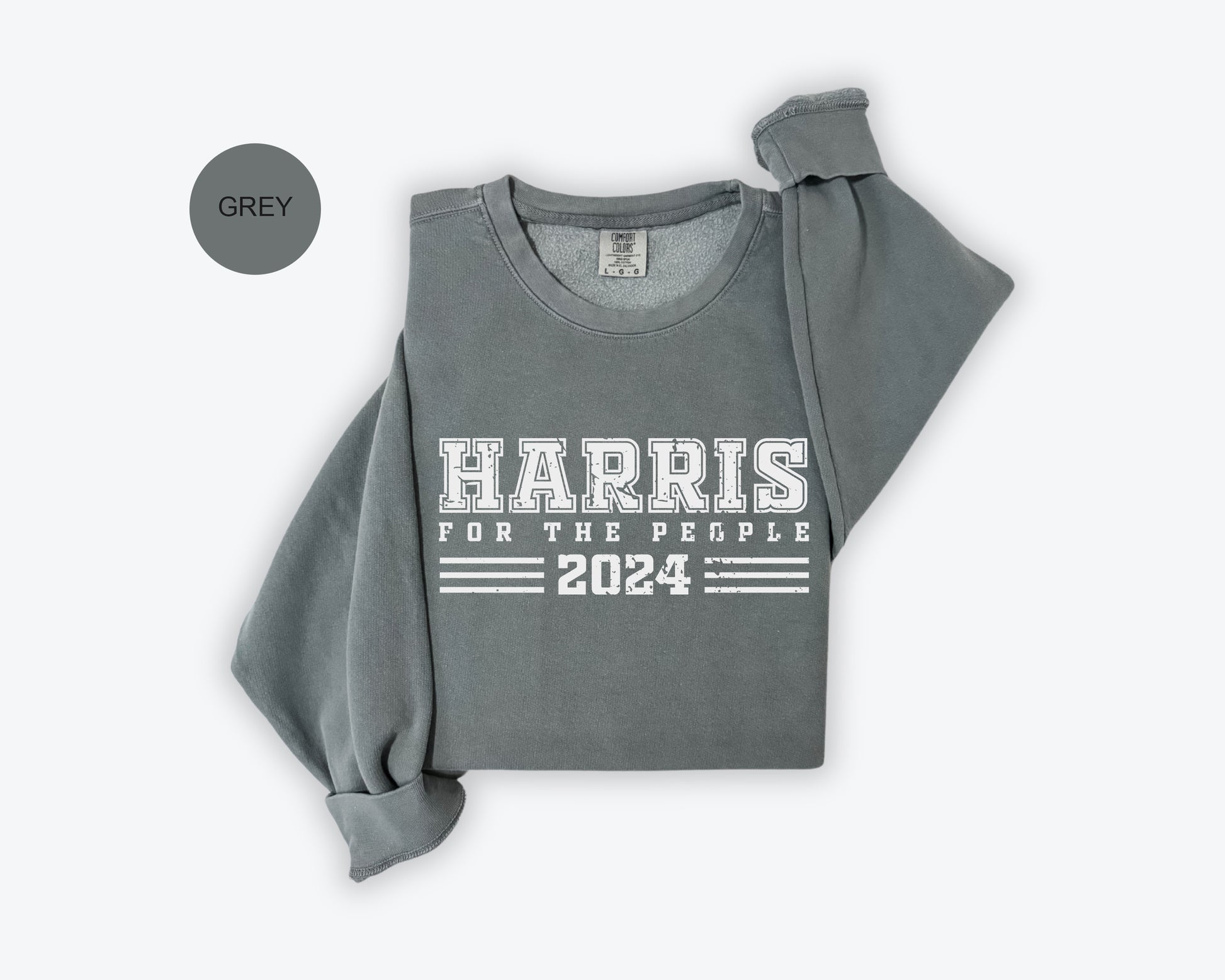 a gray shirt with the words harris for the village on it