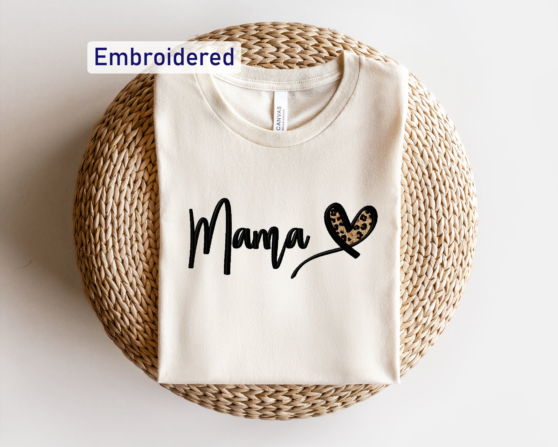 a t - shirt with the word mama written on it