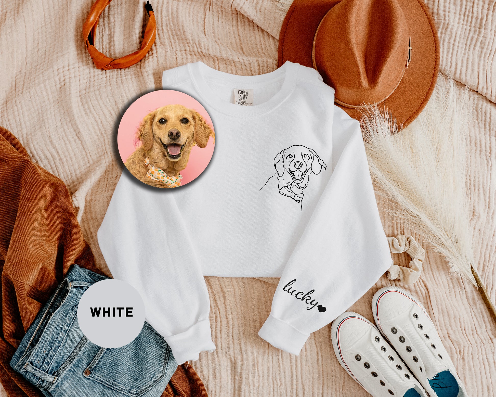 a white shirt with a picture of a dog on it