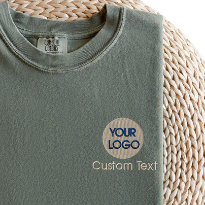 a close up of a t - shirt on a woven basket