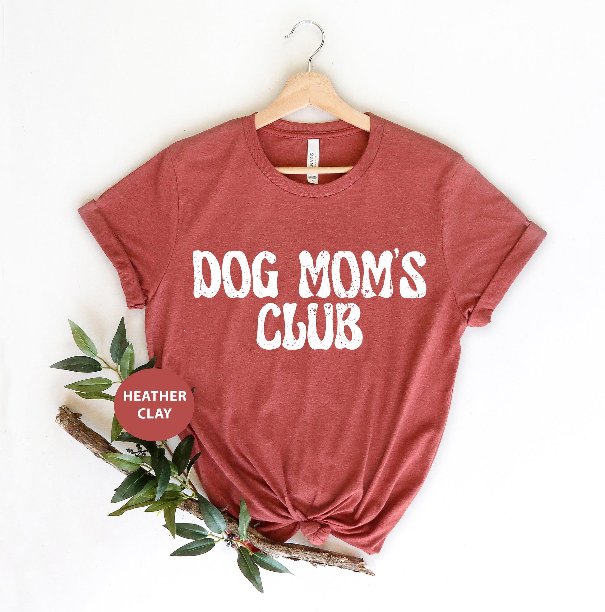 a t - shirt that says dog mom's club on it