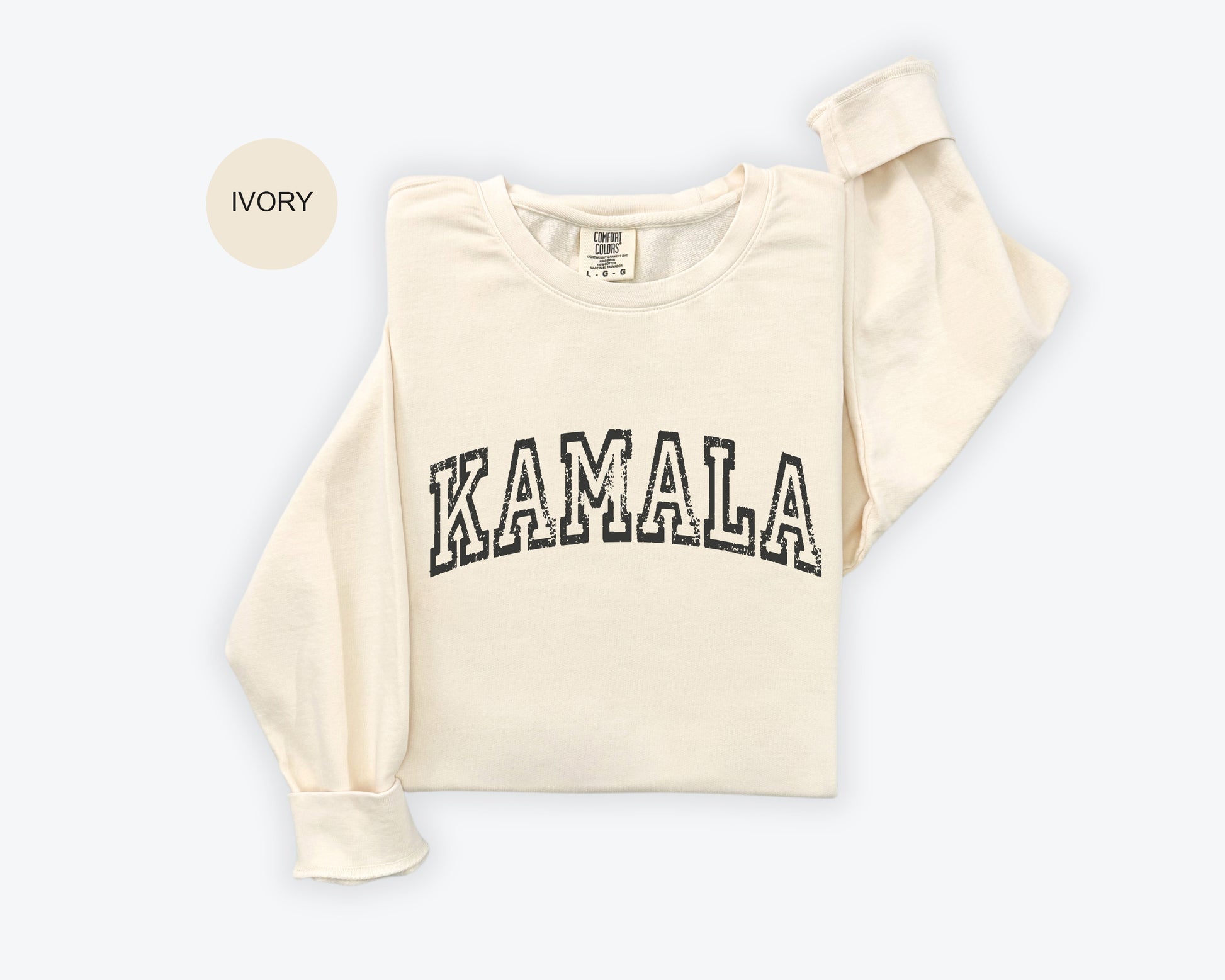 a white sweatshirt with the word kalamala printed on it