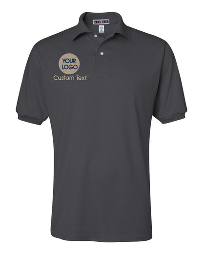 a grey polo shirt with a logo on the chest