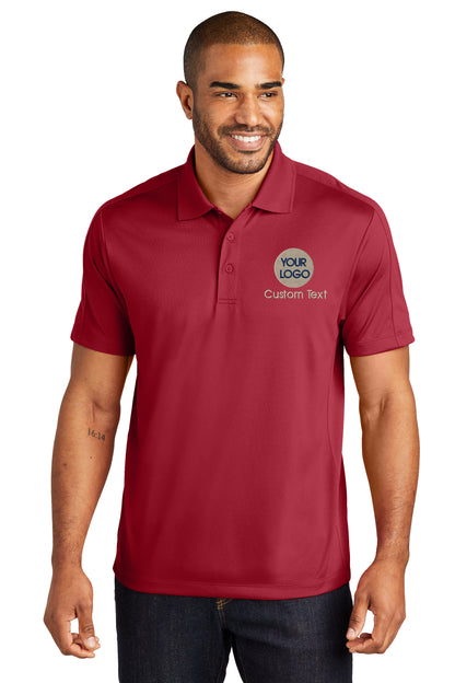 a man wearing a red polo shirt with a logo on it