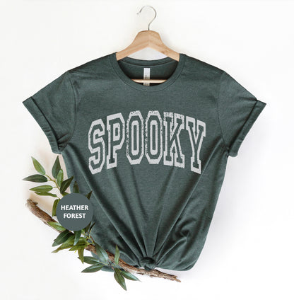 a t - shirt with the word spooky on it