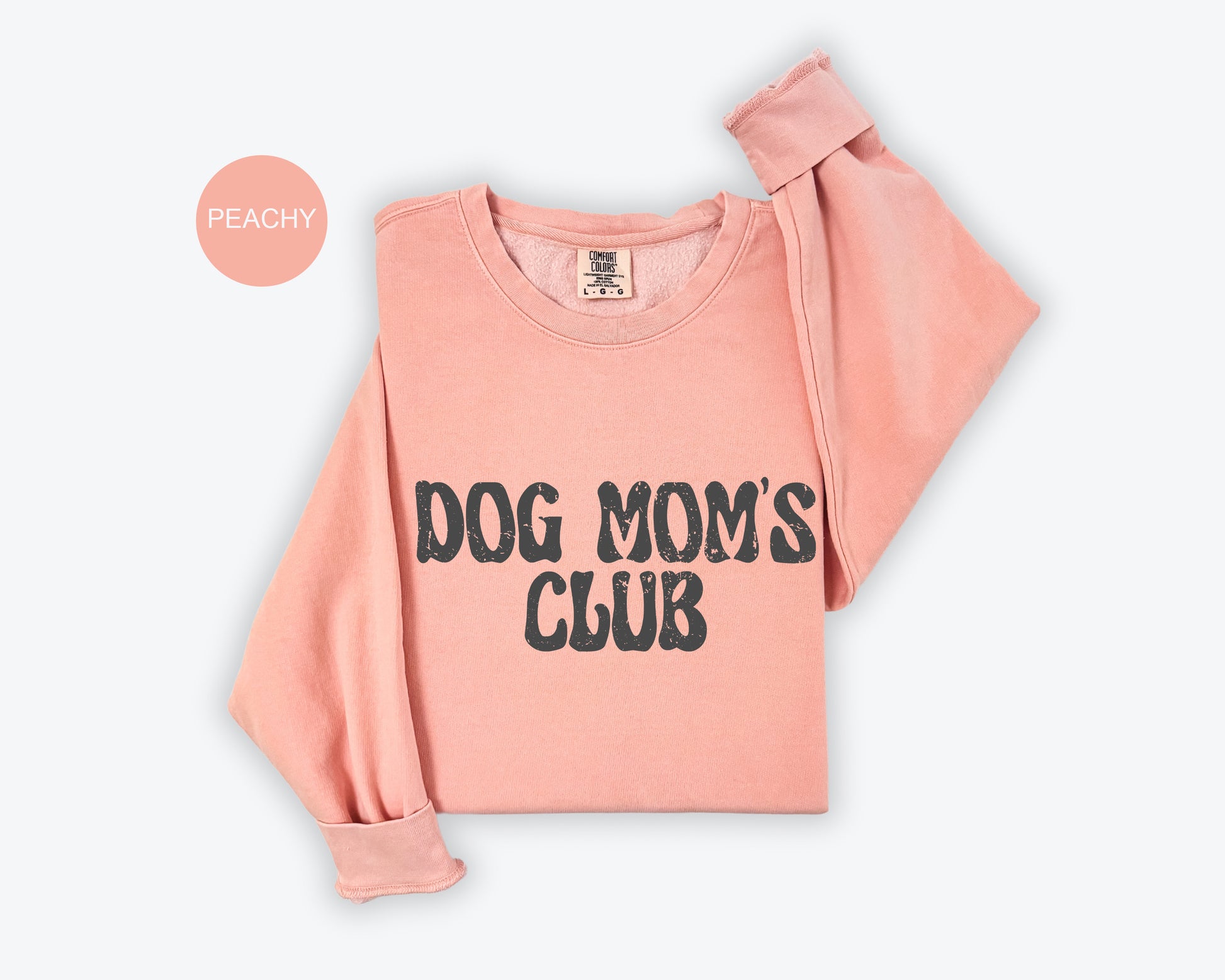 a pink shirt with the words dog mom's club on it