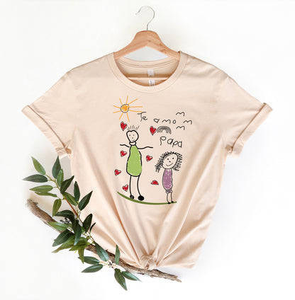 a t - shirt with a drawing of a woman and a child on it