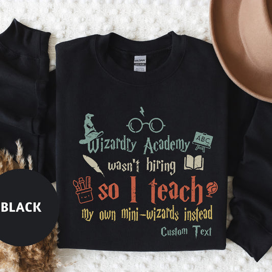 a black sweatshirt with a wizard quote on it