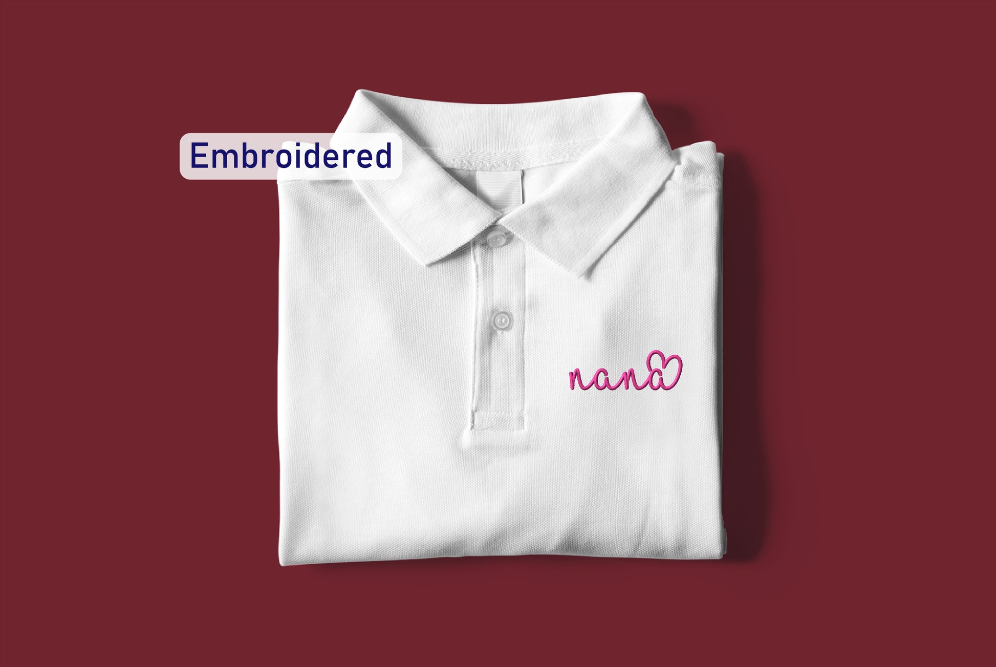 a white polo shirt with embroidered name on it