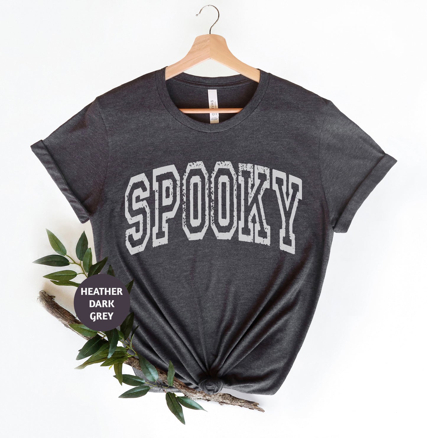 a black shirt with the word spooky on it