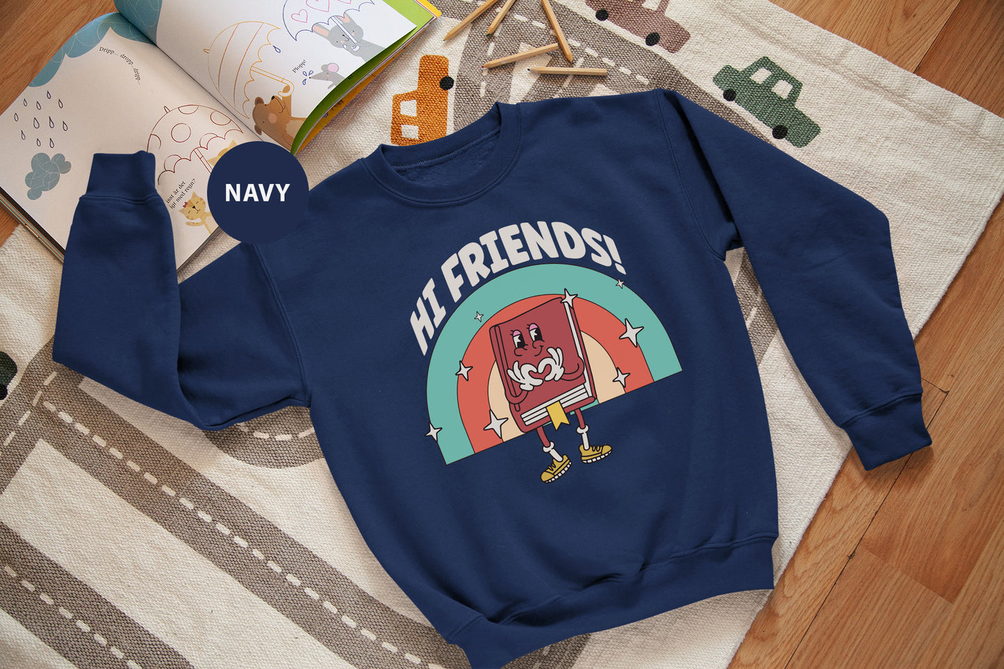 a blue sweatshirt with a picture of a cartoon character on it