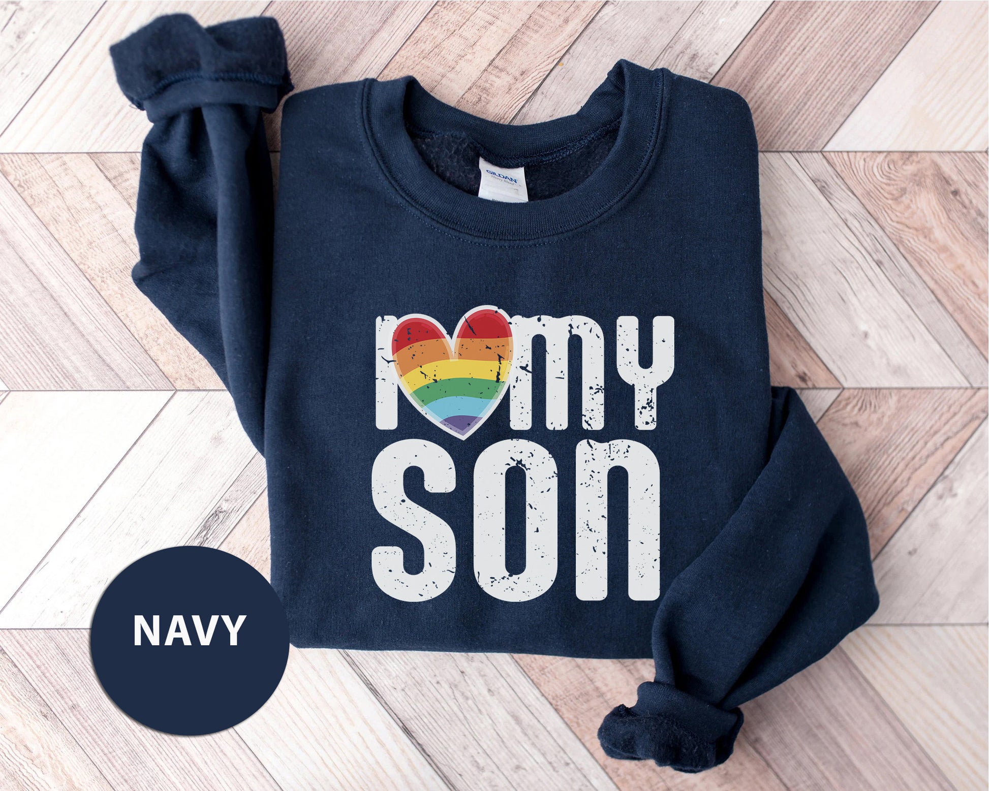 a navy sweatshirt with the words i love my son printed on it