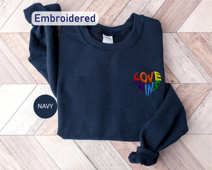 a navy colored sweatshirt with the word love on it