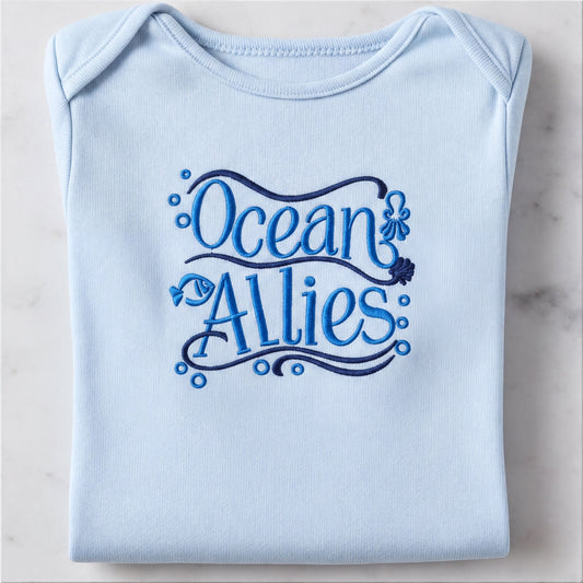 A light blue baby onesie with the text "Ocean Allies" embroidered on it.