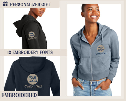 a woman wearing a gray hooded sweatshirt with embroidered text and logos. The sweatshirt has a hood and a zipper, and it is described as a personalized gift with 12 embroidery fonts and custom text.