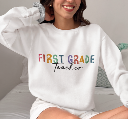 a woman sitting on a bed wearing a white sweatshirt