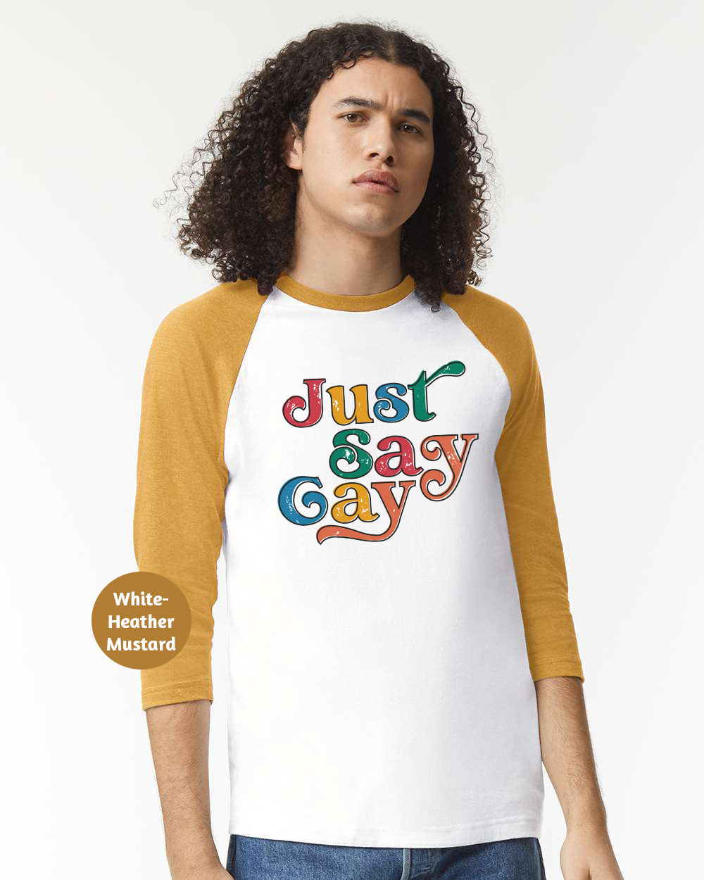 a man wearing a white and yellow shirt with the words just gay on it