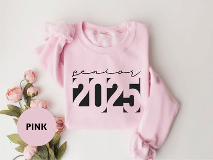 a pink sweatshirt with the word pink printed on it