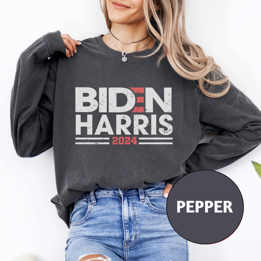 a woman wearing a sweatshirt that says bidn harris