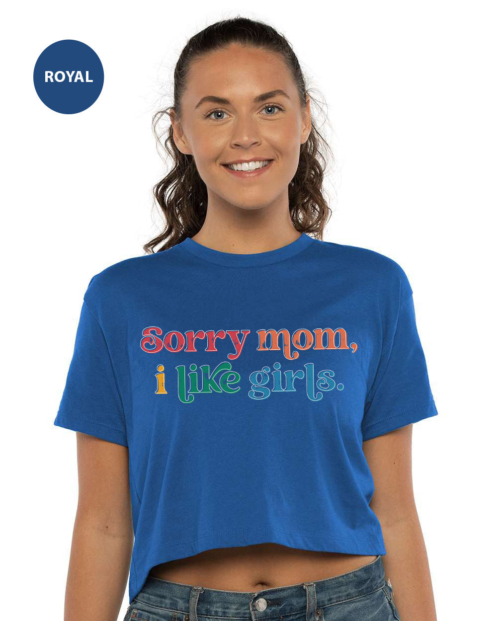 a woman wearing a blue shirt that says sorry mom i like girls