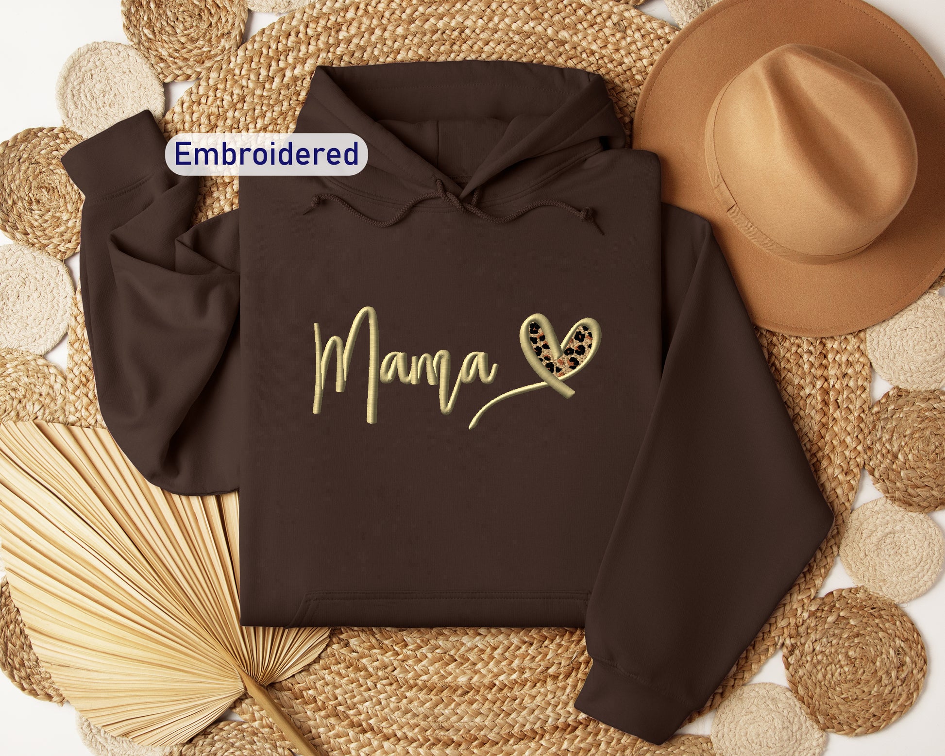 a brown hoodie with the word mama printed on it
