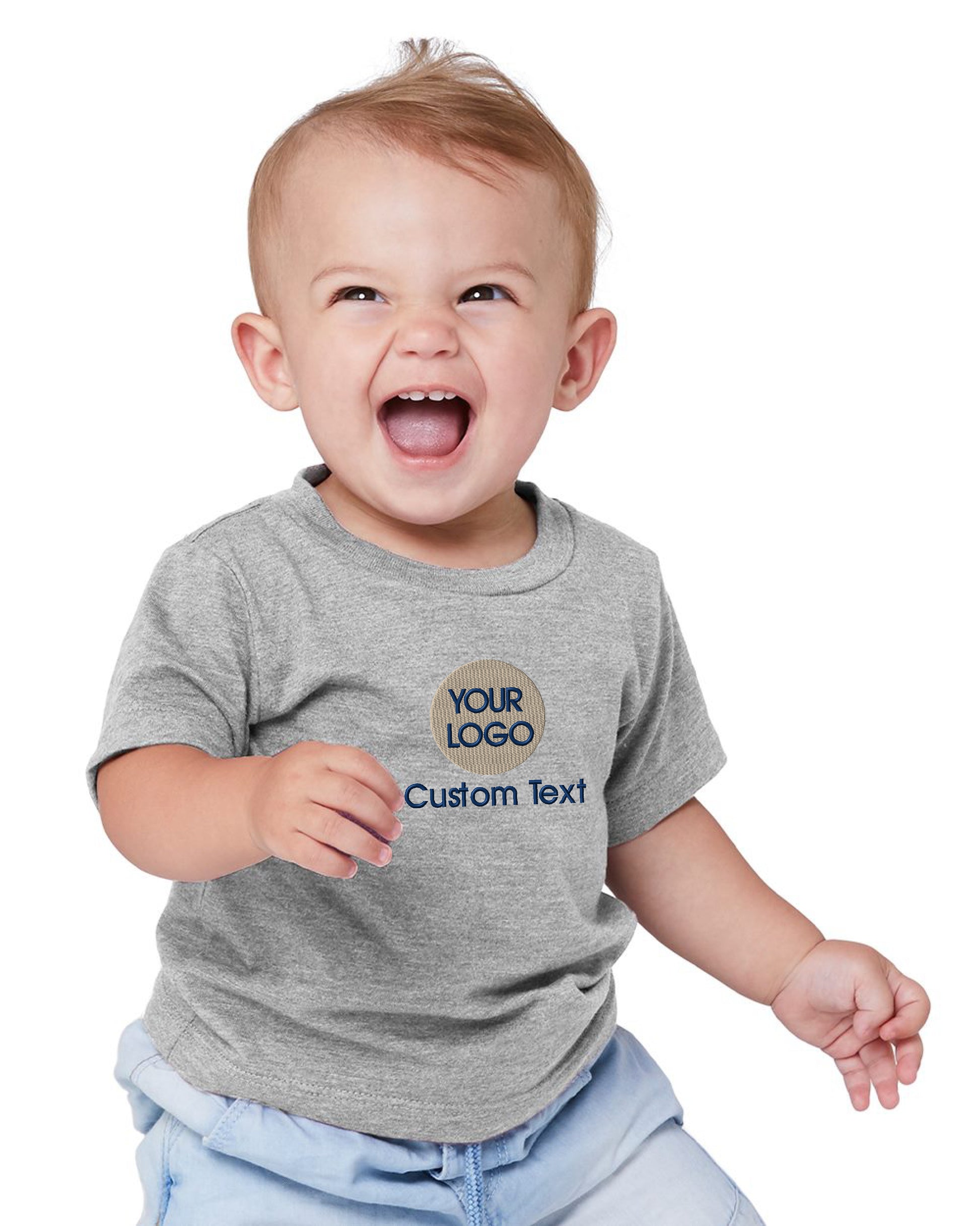 a baby laughing and wearing a t - shirt that says your logo is custom text