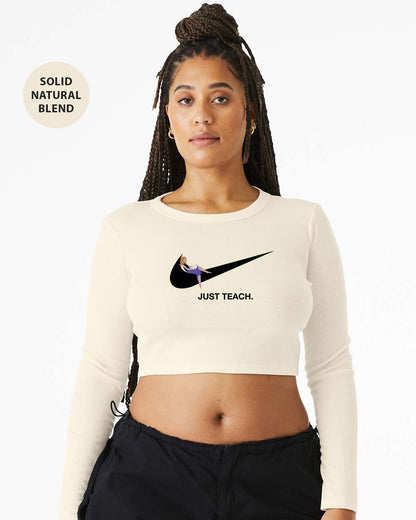 a woman wearing a white crop top with a black nike logo