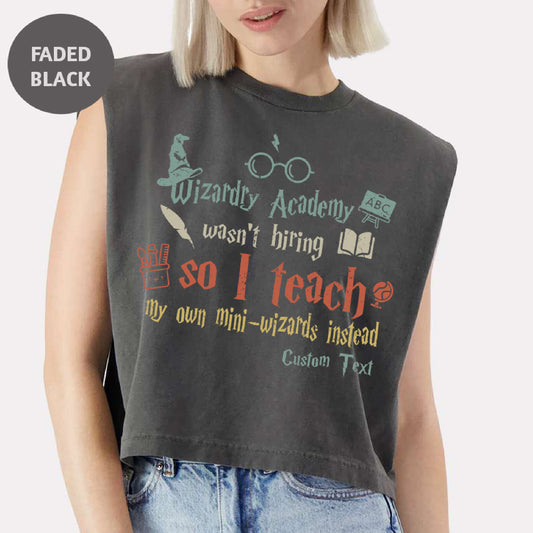 a woman with blonde hair wearing a harry potter shirt