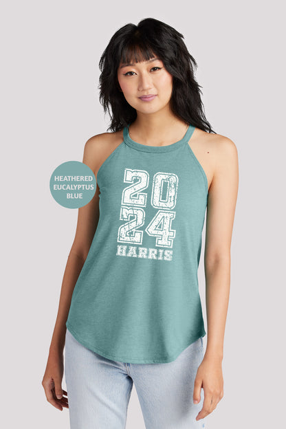 a woman wearing a tank top with the number twenty four printed on it