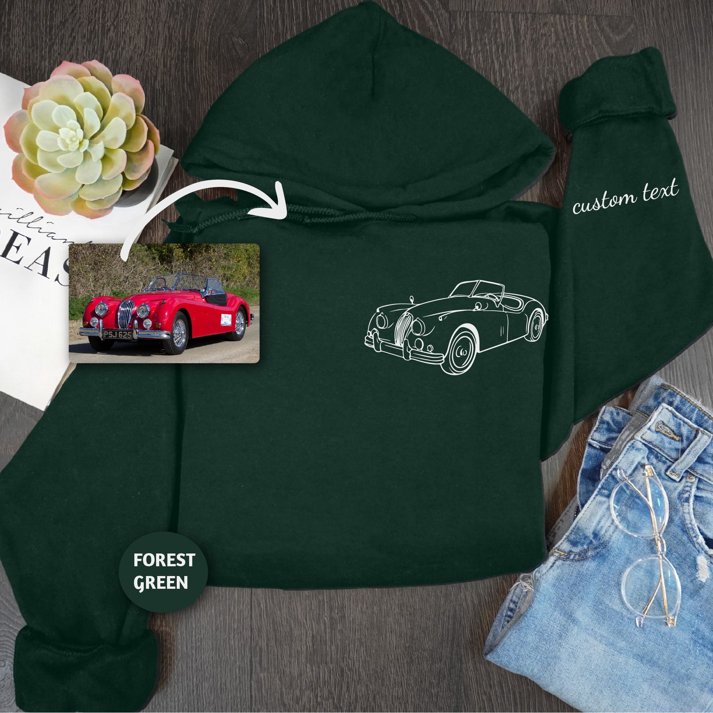 a green hoodie with a picture of a car on it