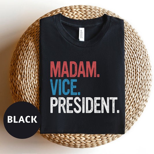 a t - shirt that reads madam vice president