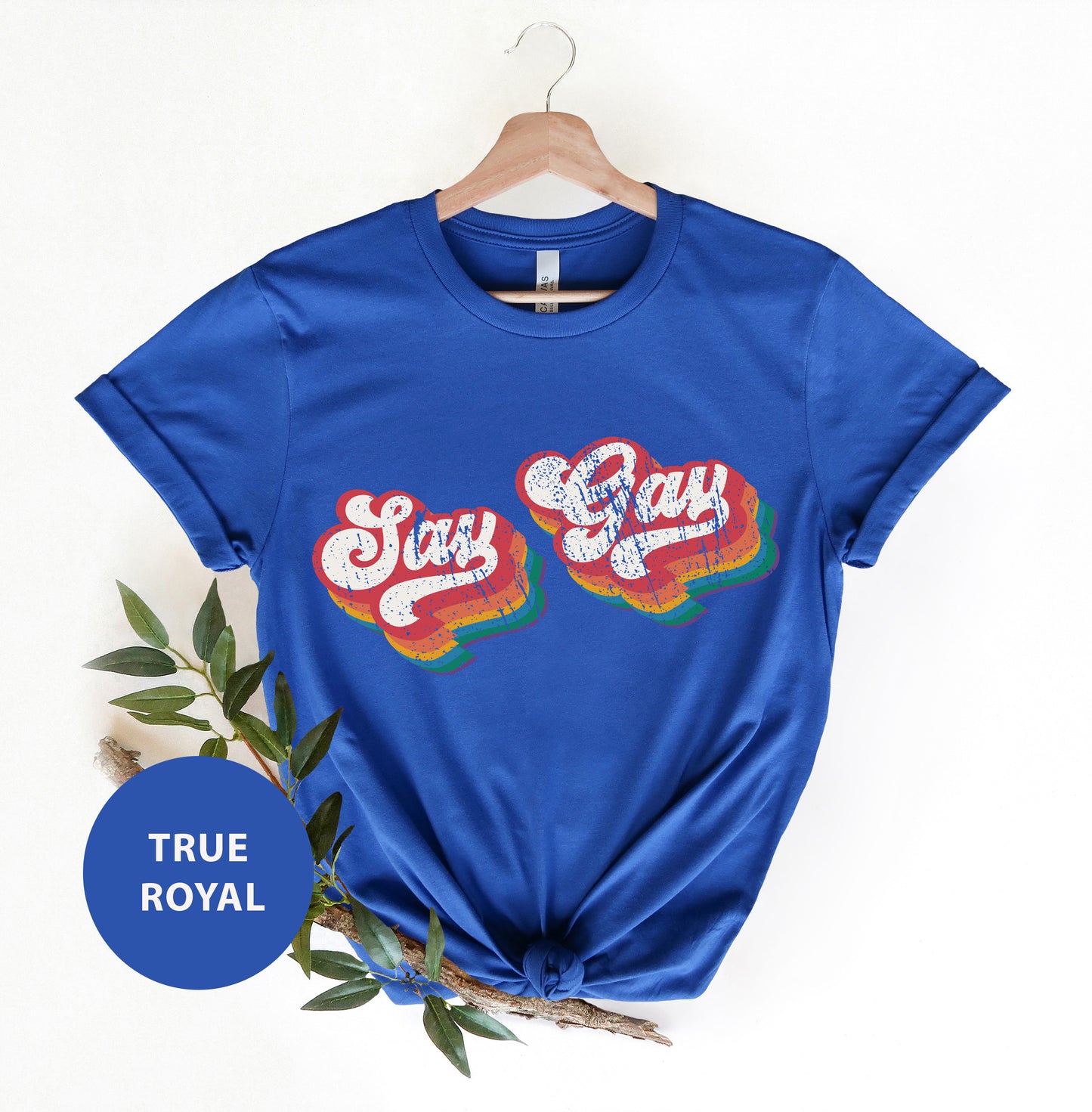 a blue t - shirt with the words stay gay on it