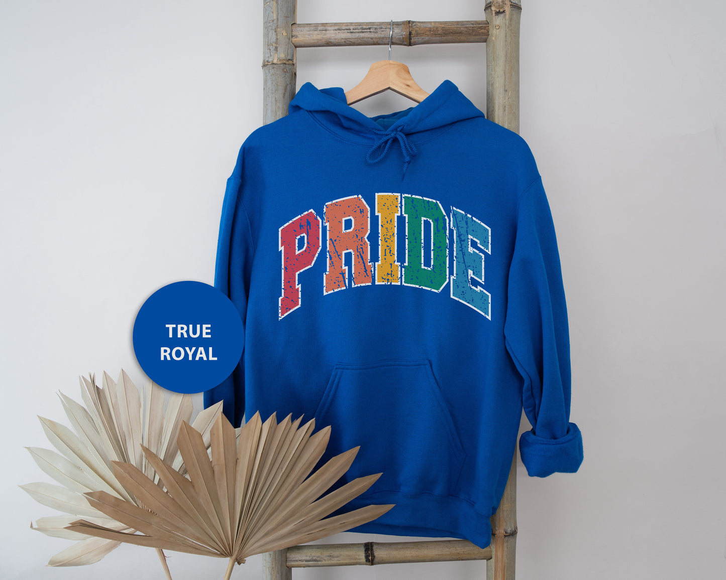 a blue hoodie with the word pride on it