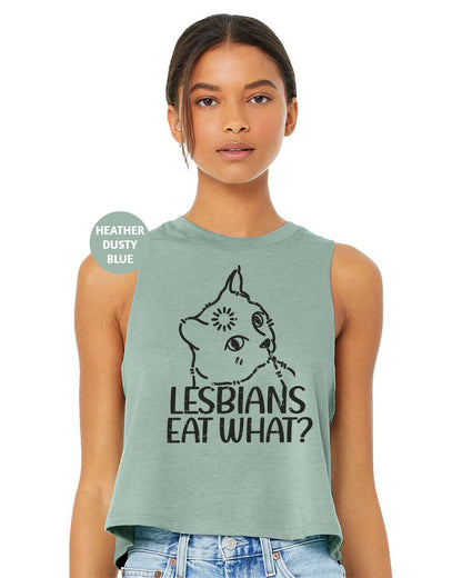 a woman wearing a tank top that says lesbians eat what?