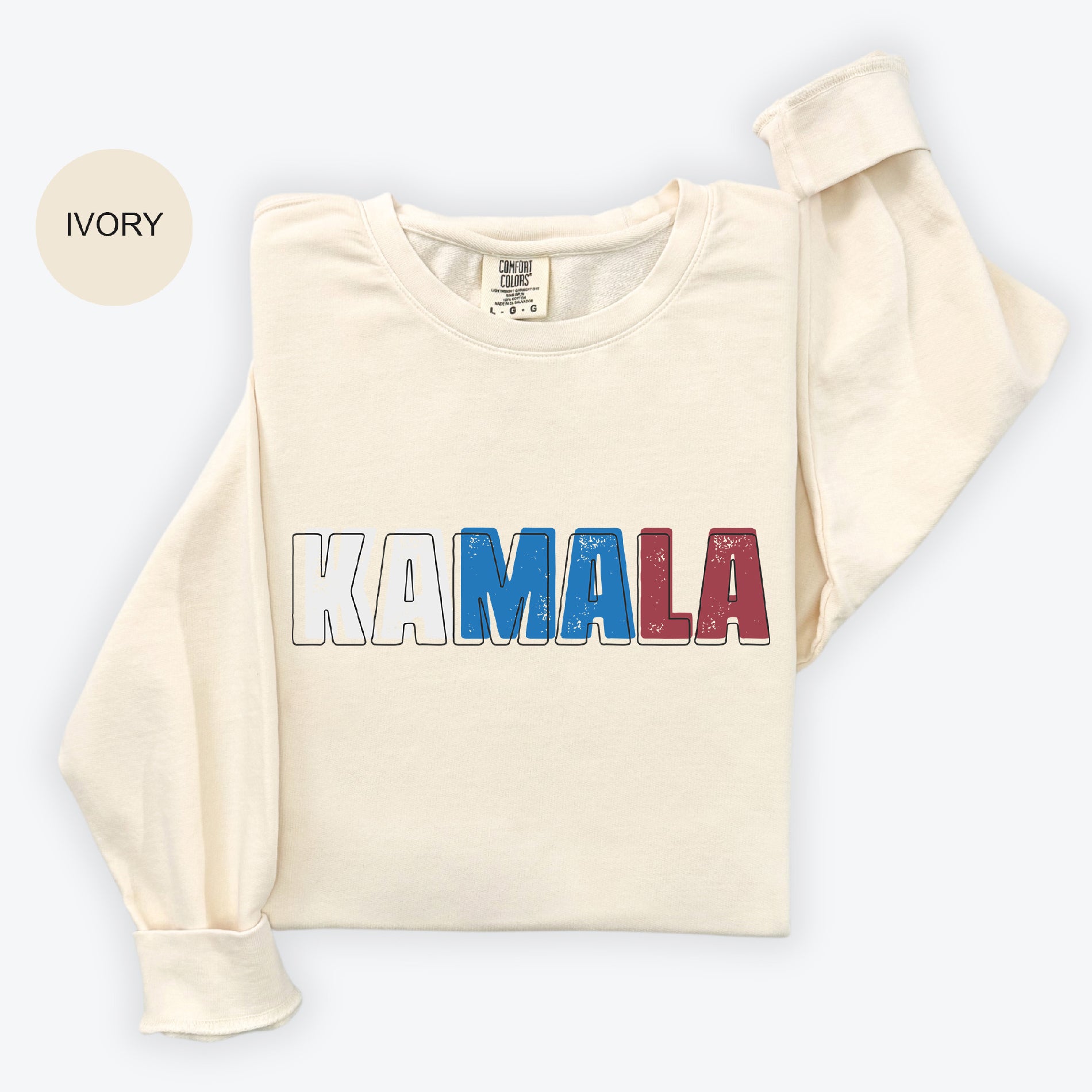 a white sweatshirt with the word kaamala printed on it