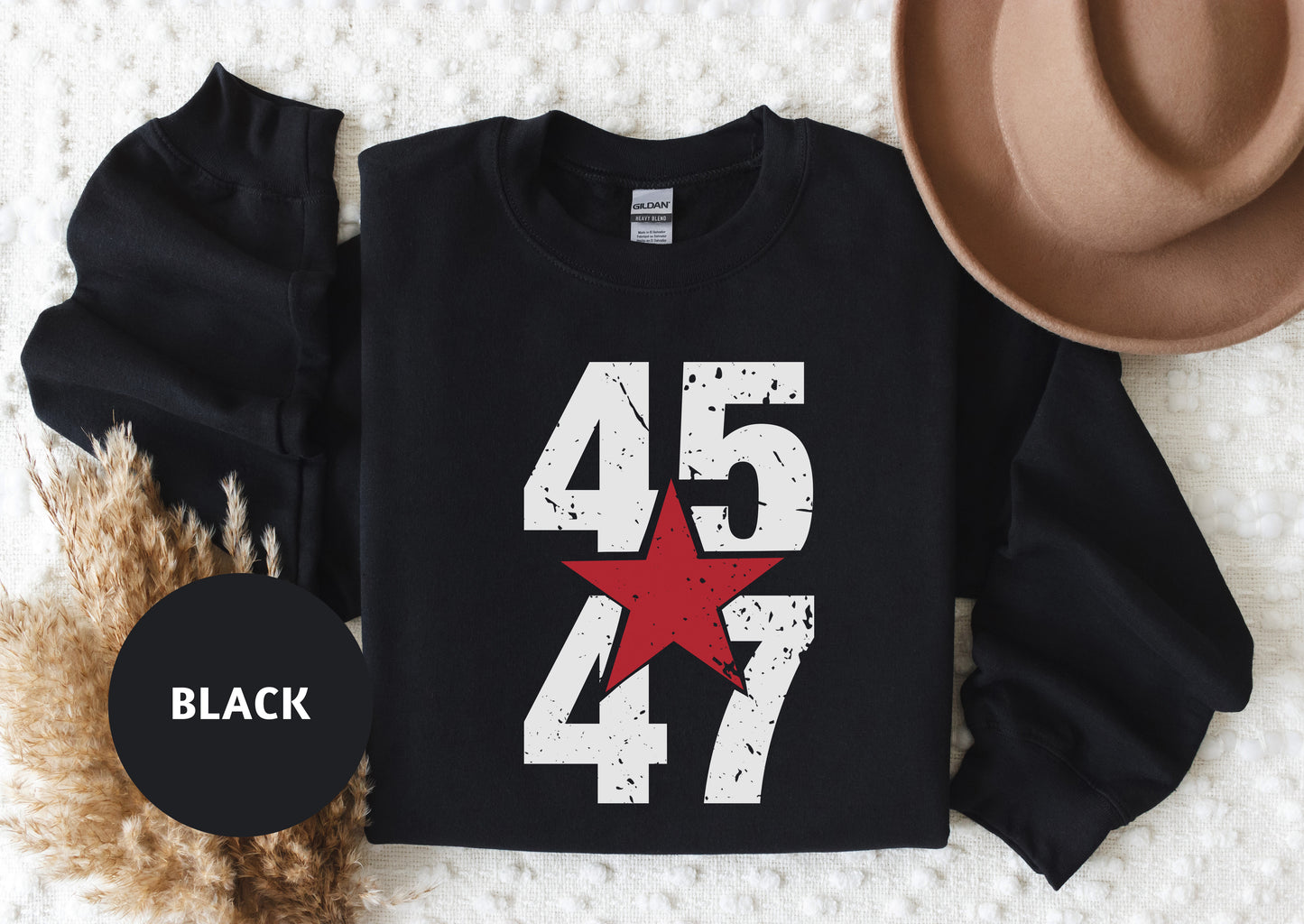 a black shirt with a red star on it