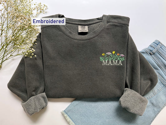 a gray sweatshirt with the words mama printed on it