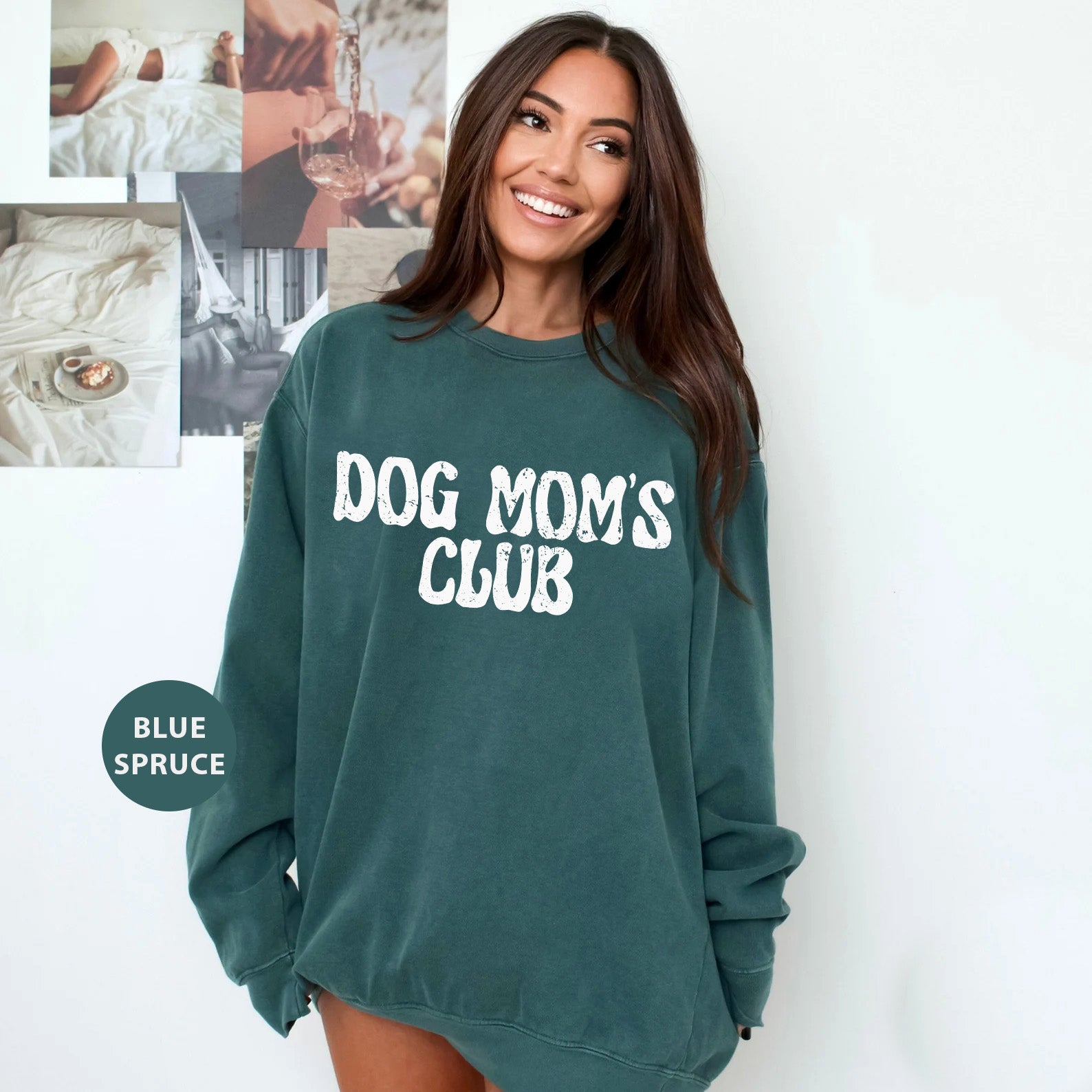 a woman wearing a dog mom's club sweatshirt