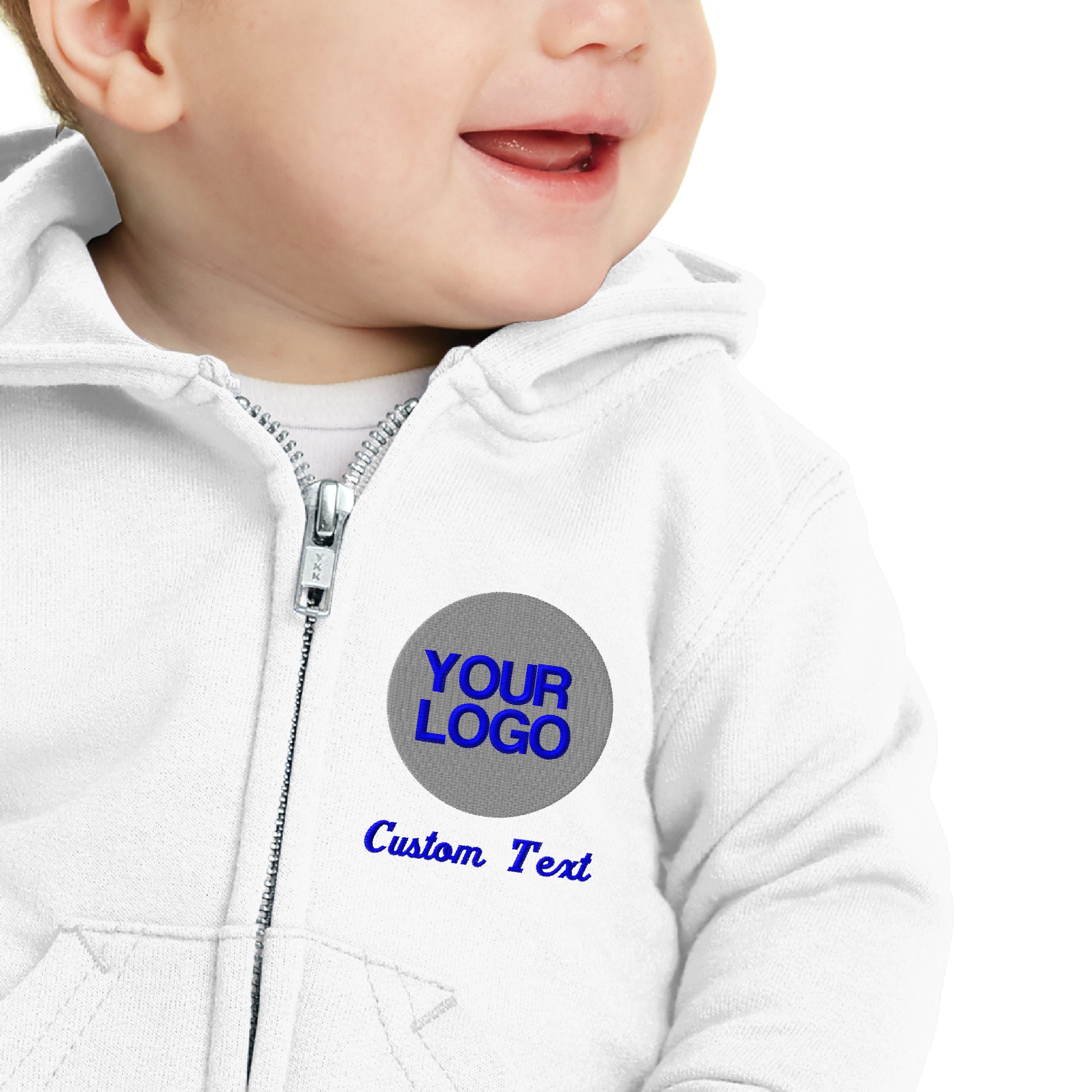 a baby wearing a white hoodie with a logo on it