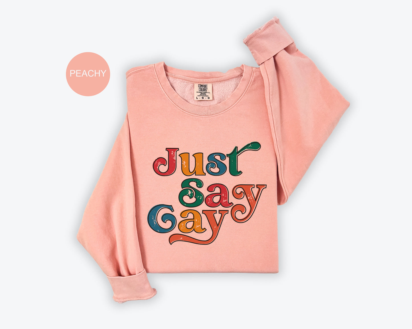 a pink shirt with the words just say gay on it