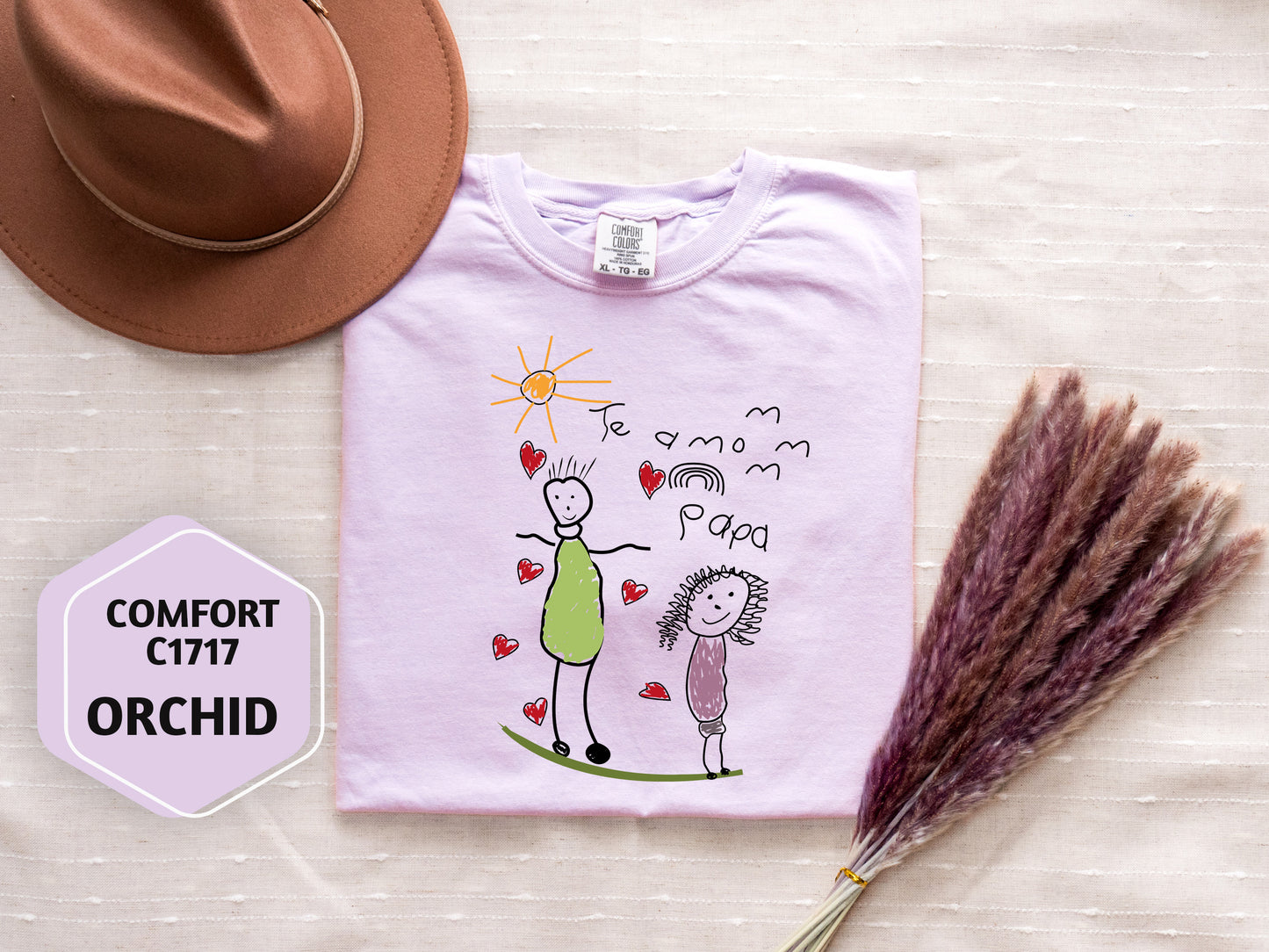 a t - shirt with a drawing of a woman and a child on it next